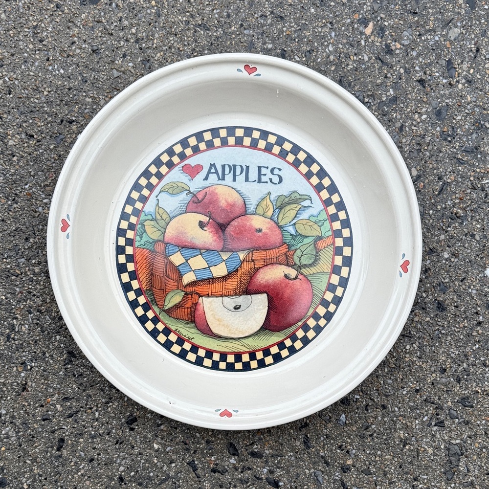Decorative Apple Plate is crafted from ceramic and designed by Susan Wingste